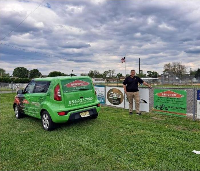 Supporting Our Community, SERVPRO Restoration of Blackwood NJ - image of SERVPRO vehicle and man outside