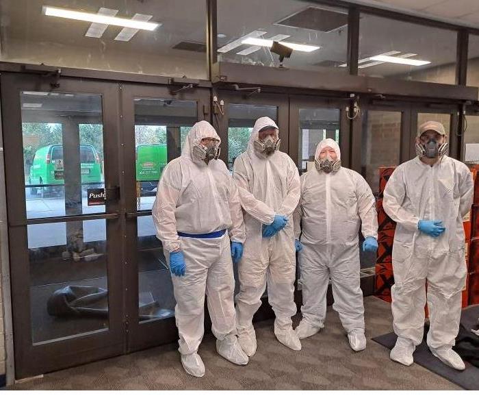 Covid 19 cleaning, CDC covid cleaning - image of technicians in PPE